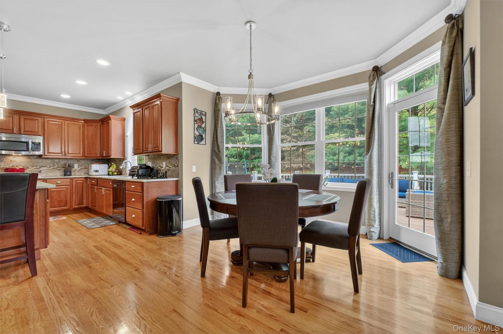 219 Country Club Road Hopewell Junction, NY 12533 - Photo 12 of 49 a view of a dining room with furniture window and wooden floor