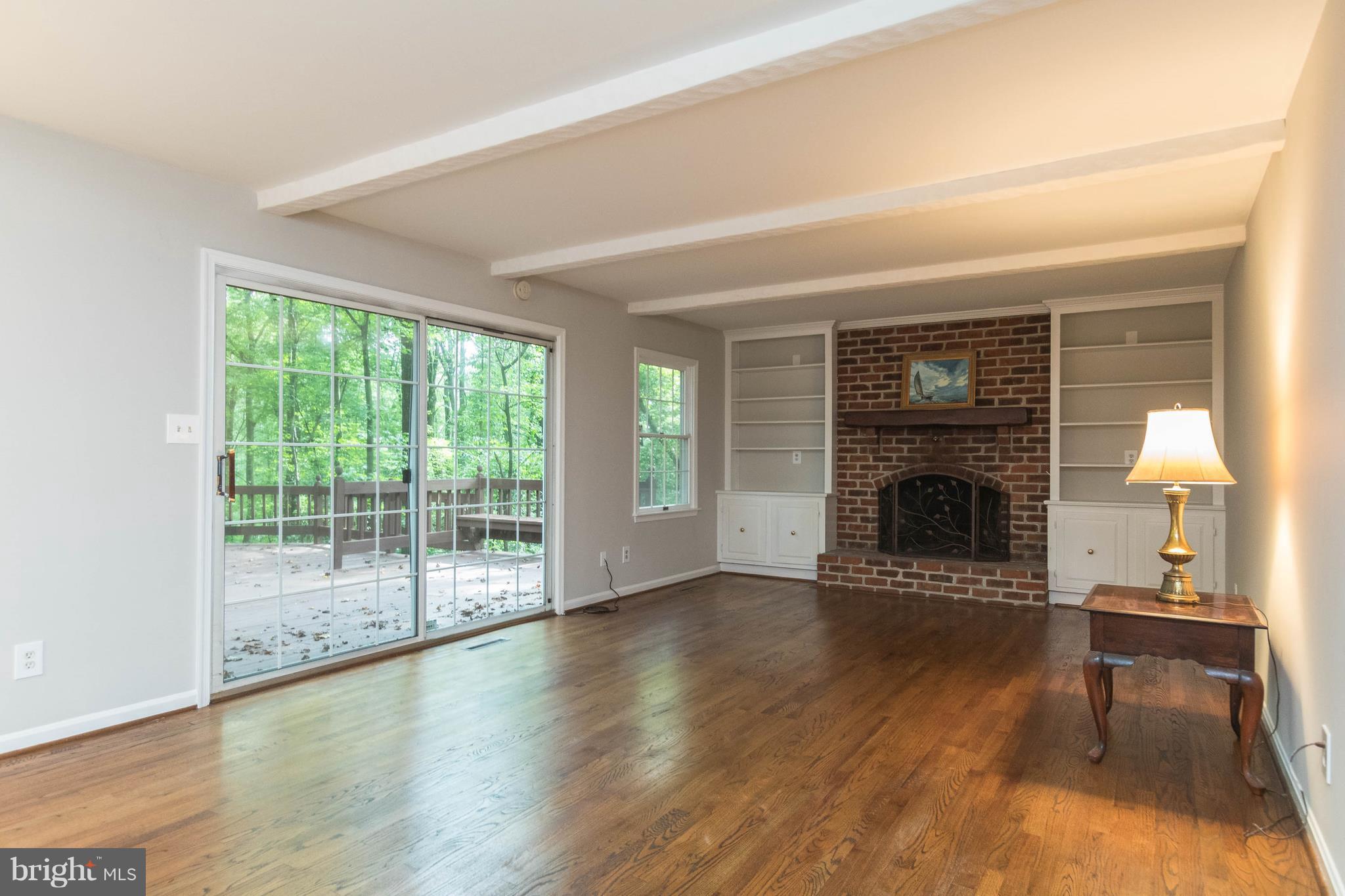 746 Chapel Ridge Road Lutherville-Timonium, MD 21093 - Photo 13 of 30 Family Room with SGD to Deck & Fireplace