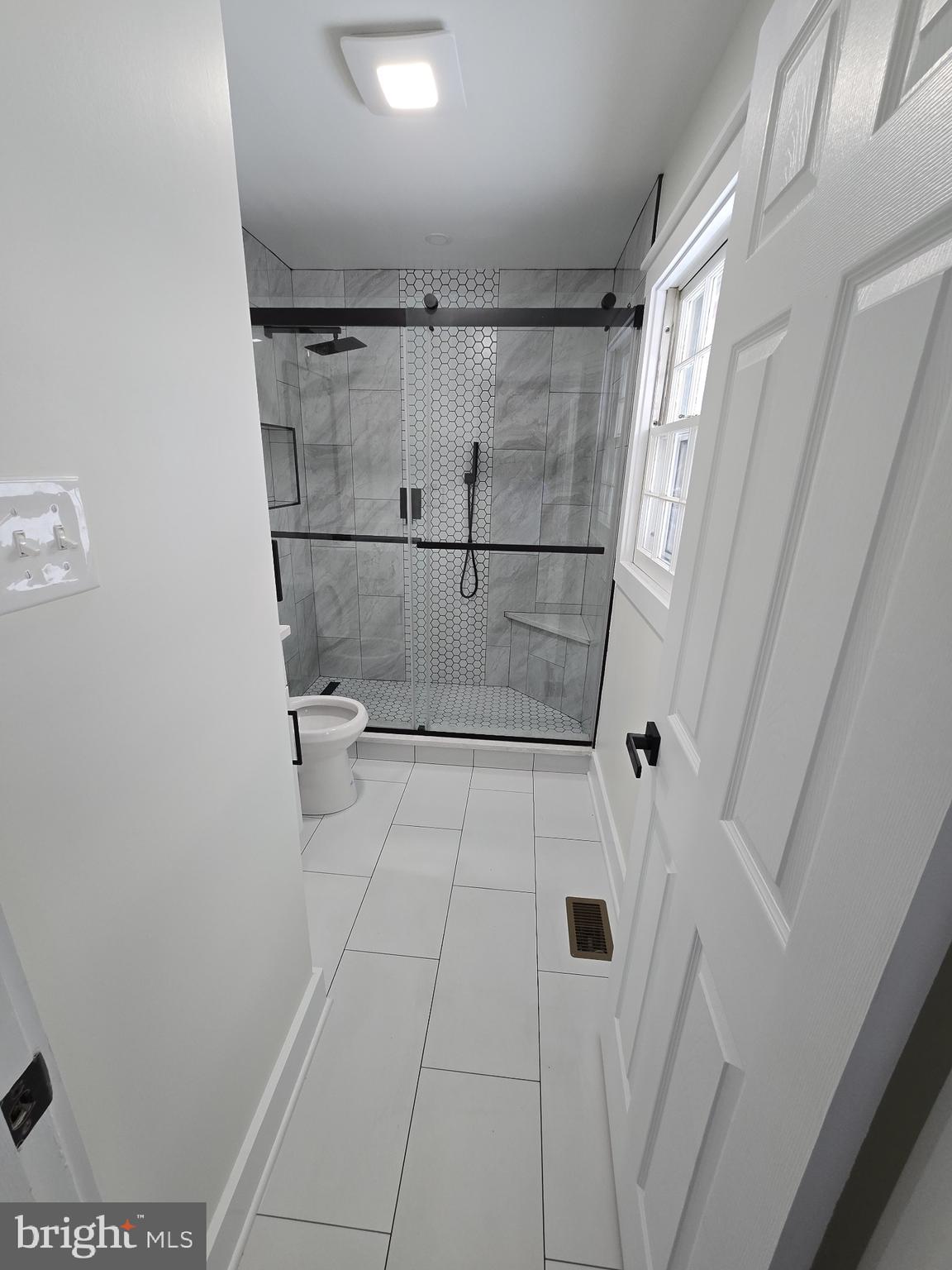 1014 Nora Drive Silver Spring, MD 20904 - Photo 11 of 23 a bathroom with a shower