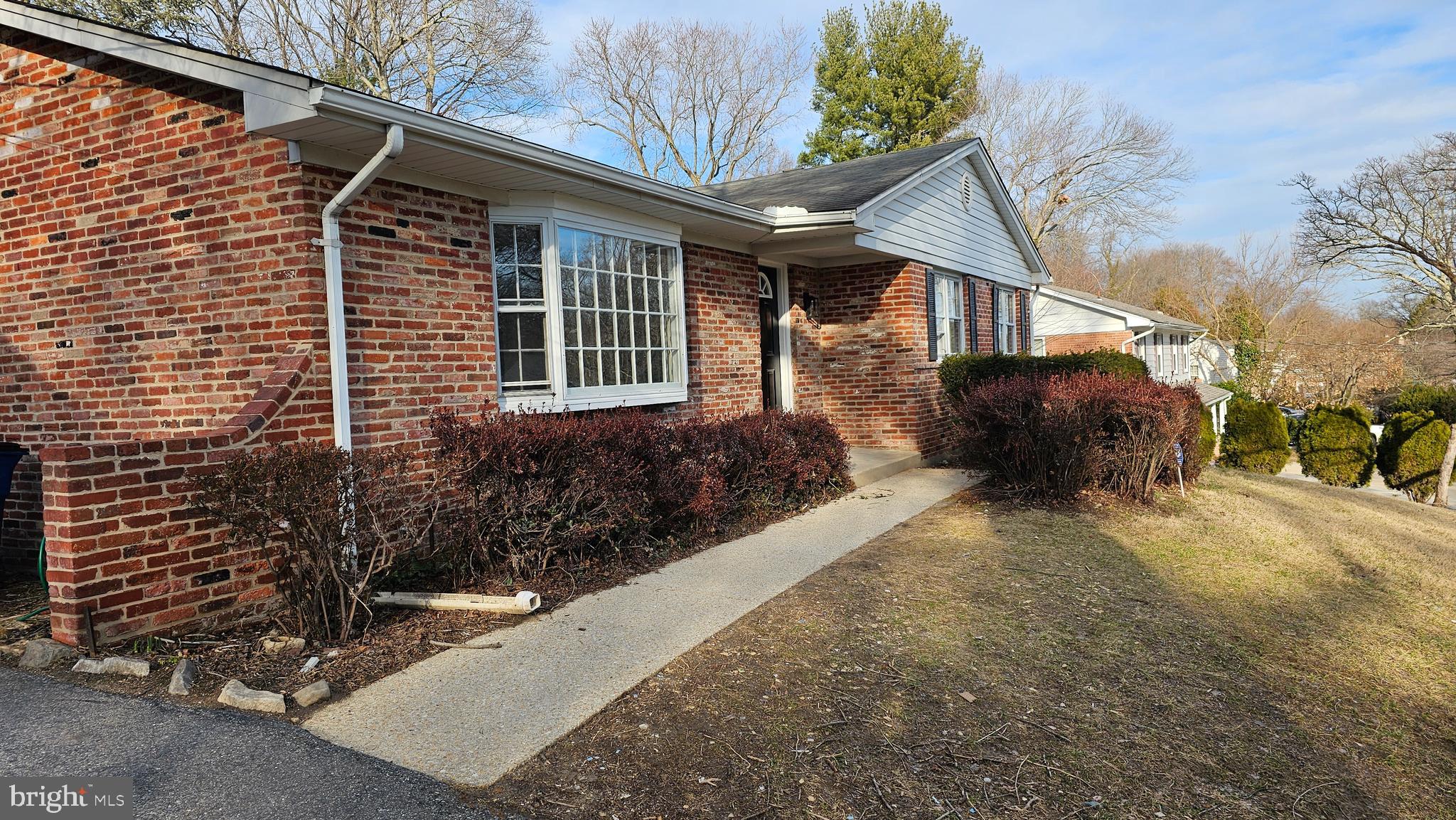 1014 Nora Drive Silver Spring, MD 20904 - Photo 2 of 23 a view of a house with a yard and garage
