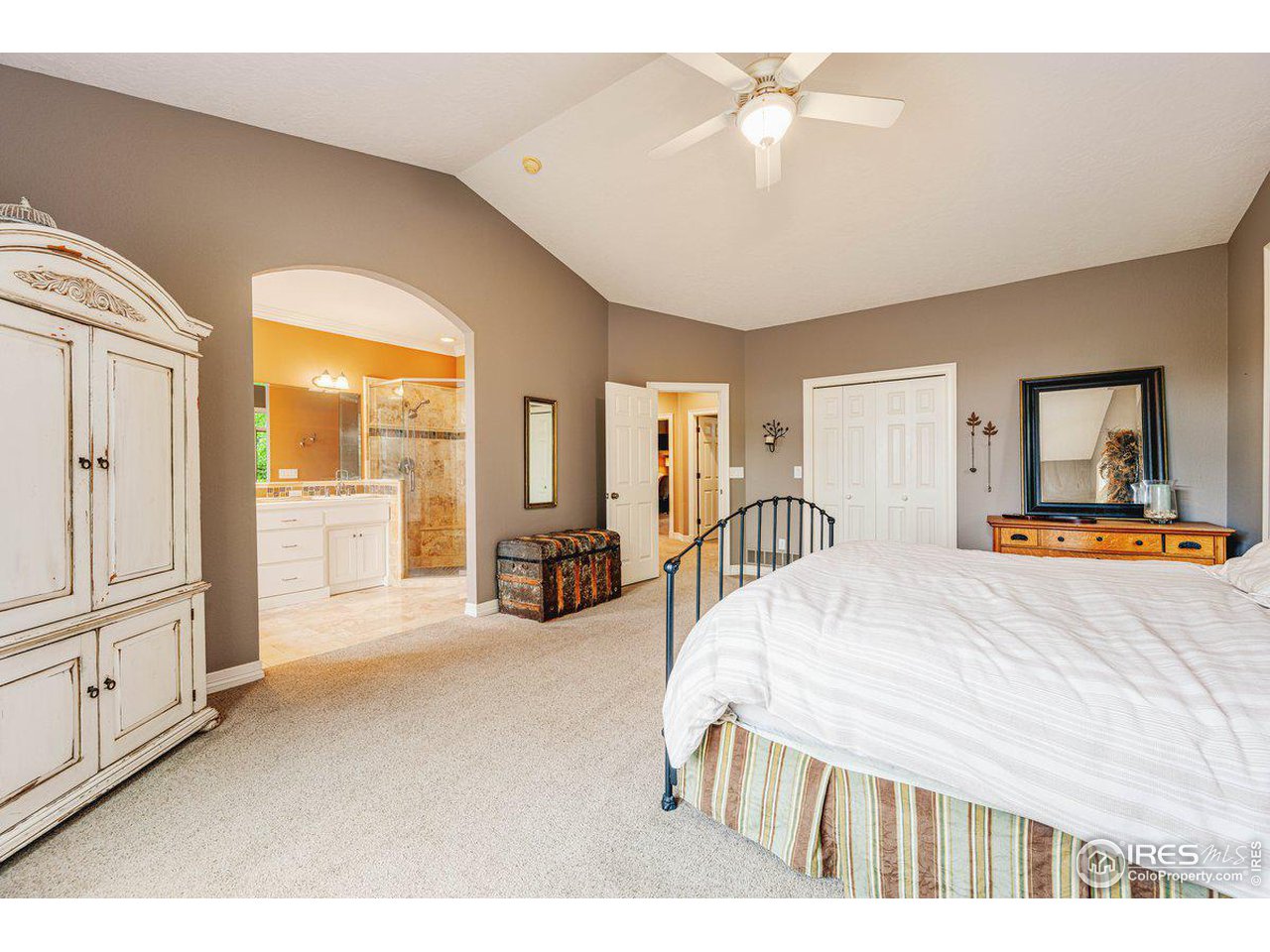 1105 Wyndham Hill Road Fort Collins, CO 80525 - Photo 21 of 40 Primary Bedroom w/ Walk In Closet