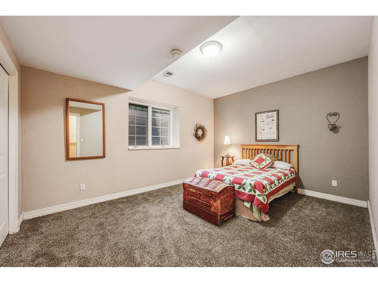 1105 Wyndham Hill Road Fort Collins, CO 80525 - Photo 35 of 40 Basement Bedroom