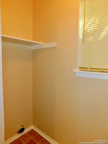 a view of a small space with window