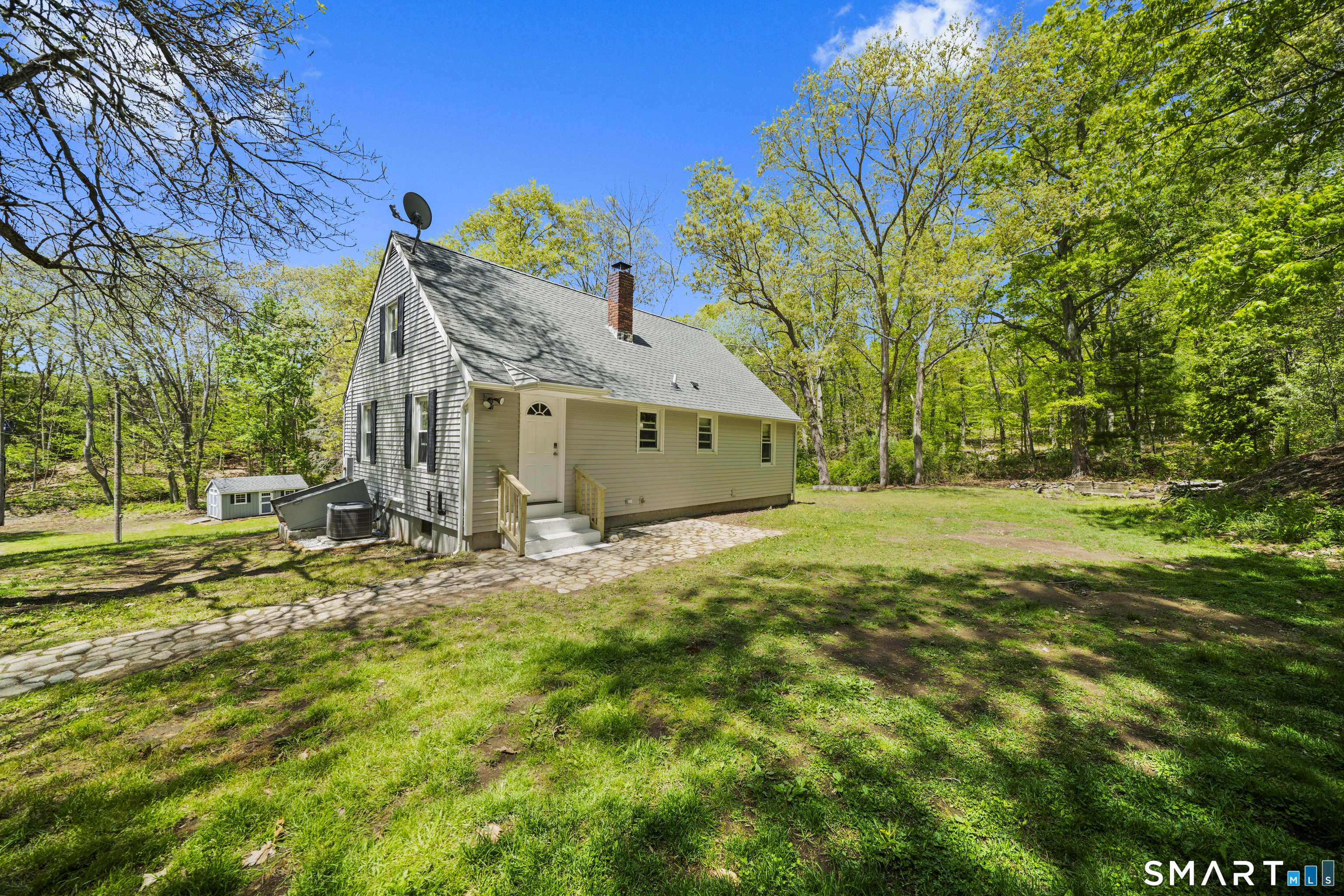 14 Church Street Sprague, CT 06330 - Photo 31 of 36 a view of a house with a backyard