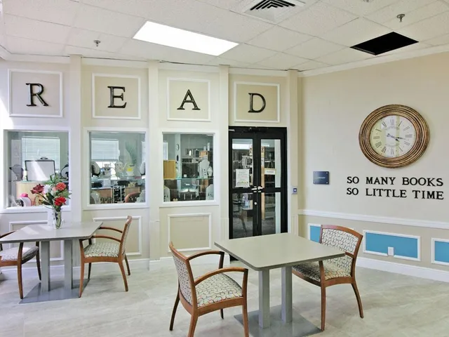 a view of swimming pool with outdoor seating