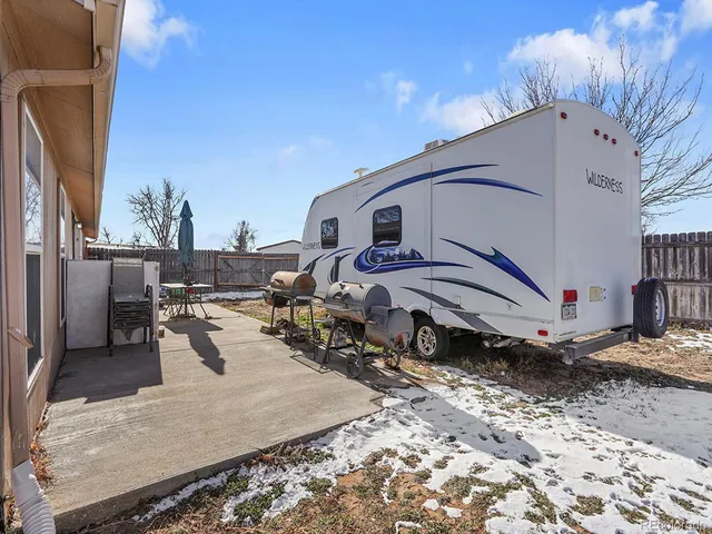 a view of a backyard of a house