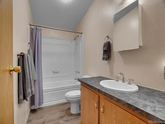 a room with furniture and a window