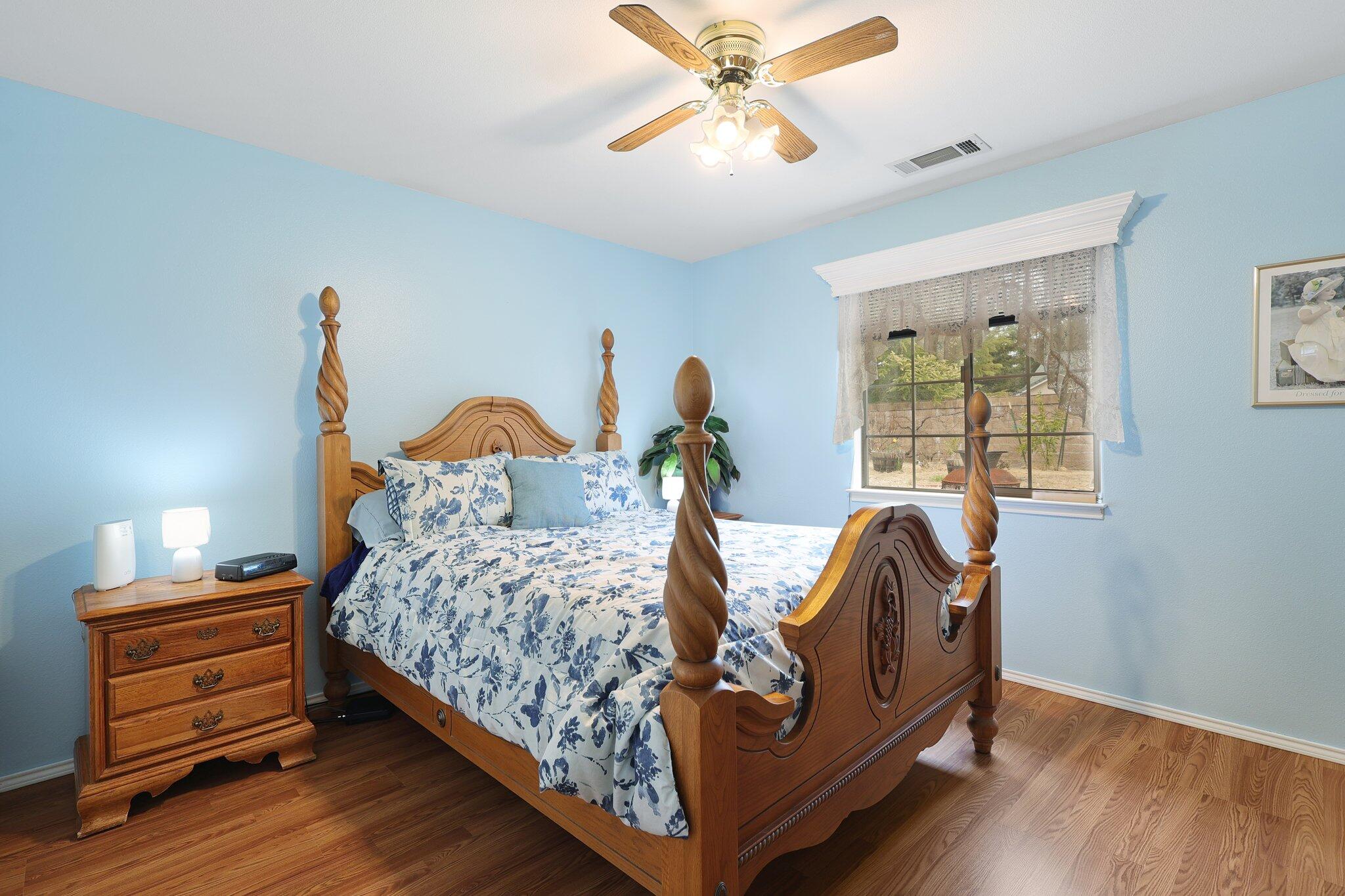 19271 Lexington Lane Redding, CA 96003 - Photo 19 of 39 a bed room with a bed and a window