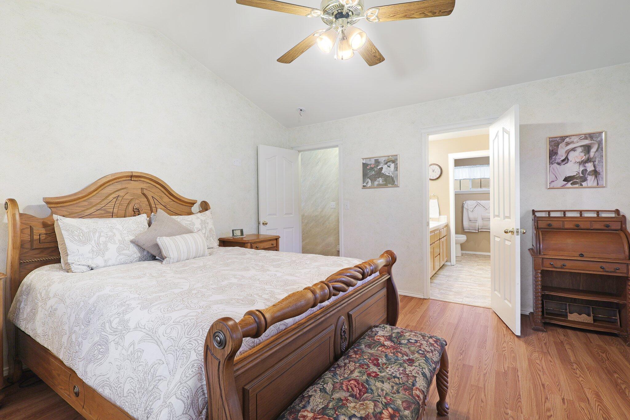 19271 Lexington Lane Redding, CA 96003 - Photo 21 of 39 a bedroom with a bed and a television