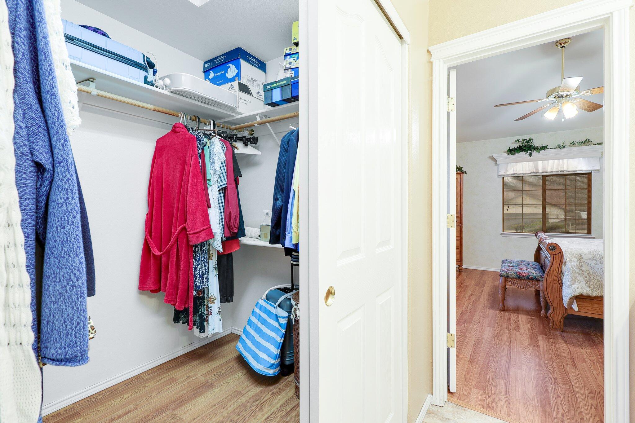 19271 Lexington Lane Redding, CA 96003 - Photo 23 of 39 a view of a room with furniture and clothes