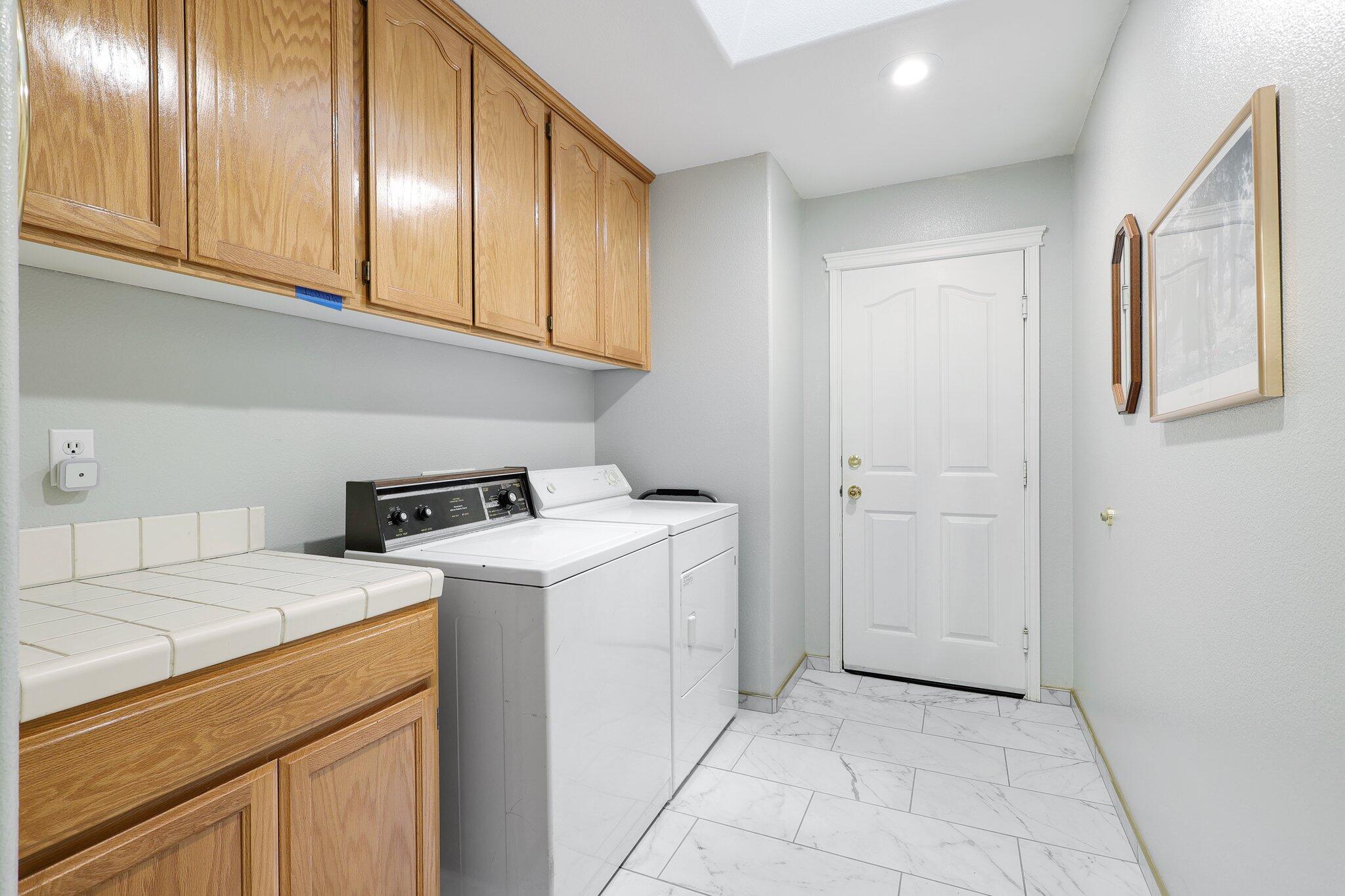19271 Lexington Lane Redding, CA 96003 - Photo 26 of 39 a utility room with dryer and washer