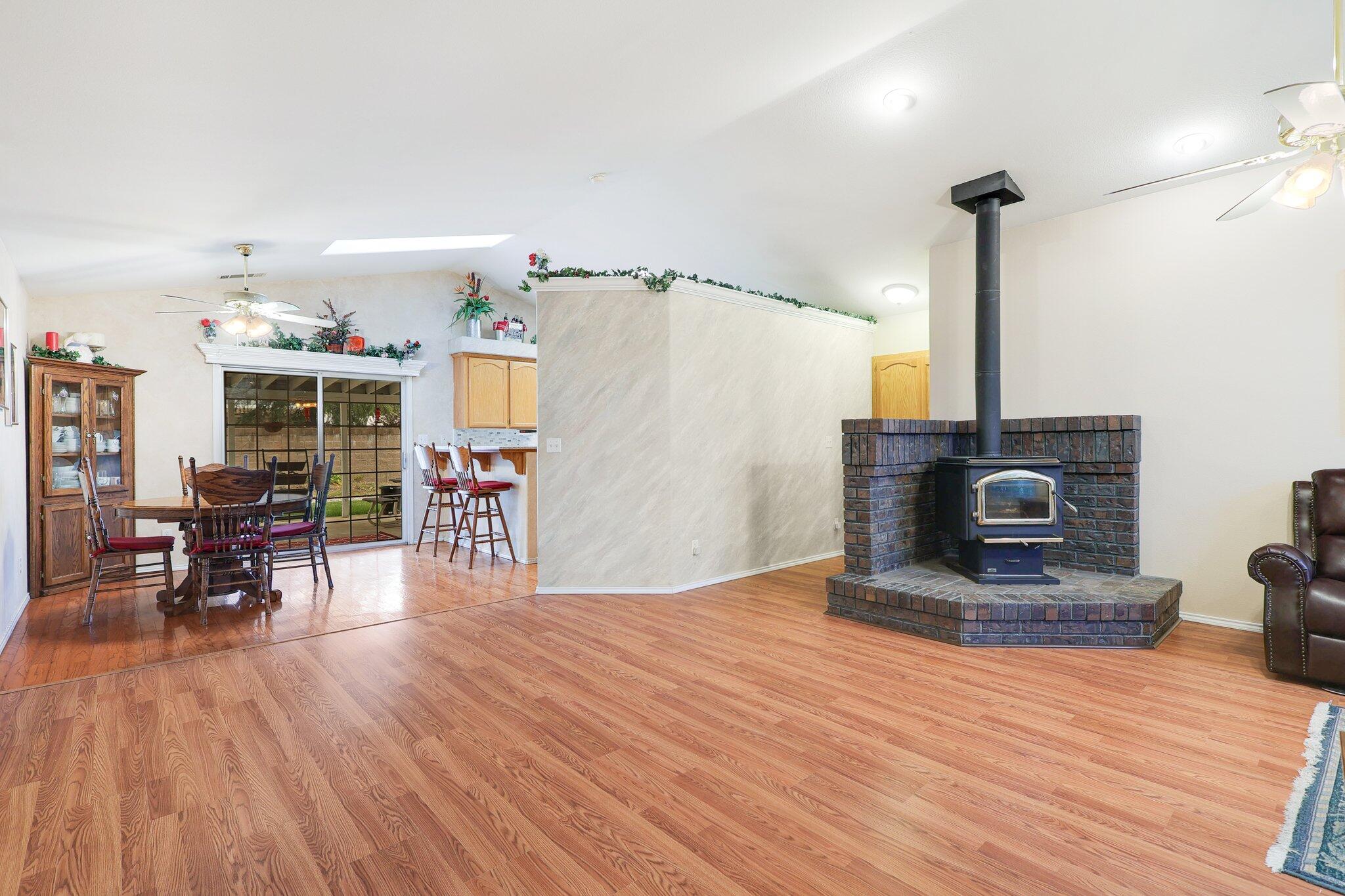 19271 Lexington Lane Redding, CA 96003 - Photo 8 of 39 a living room with furniture and wooden floor