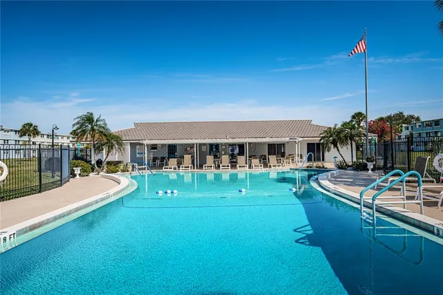 a view of a house with swimming pool