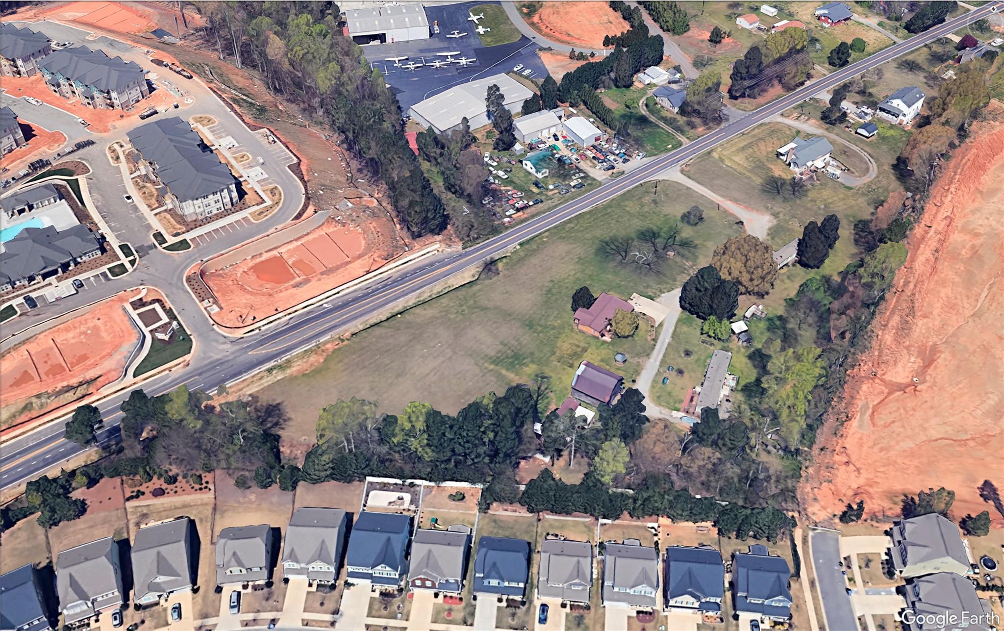 0 Perth Road Mooresville, NC 28117 - Photo 5 of 8 an aerial view of a residential building with an outdoor space