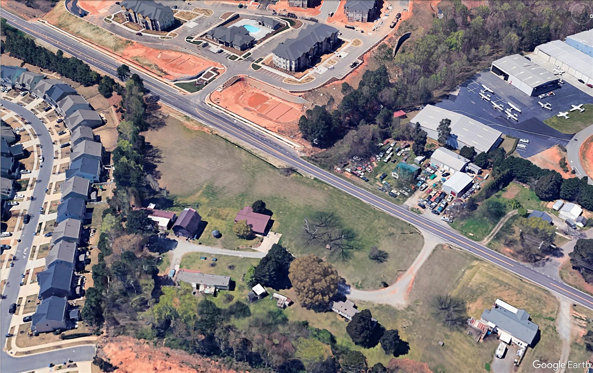 0 Perth Road Mooresville, NC 28117 - Photo 6 of 8 an aerial view of a house with a garden and balcony
