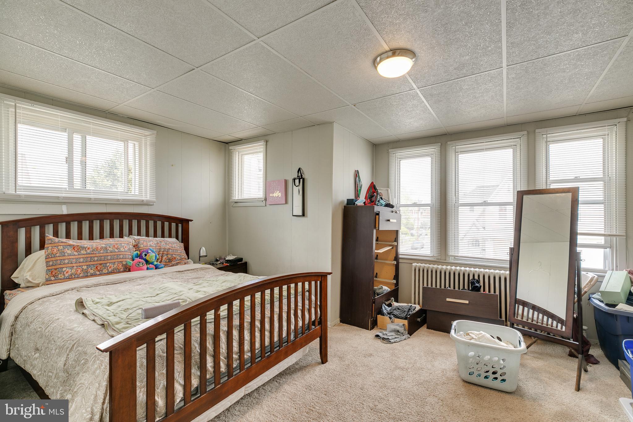 242 Kingston Road Upper Darby, PA 19082 - Photo 16 of 27 a bedroom with furniture and windows