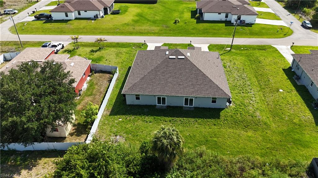 4816 24th Street Southwest Lehigh Acres, FL 33973 - Photo 28 of 32 a view of a garden with an outdoor space