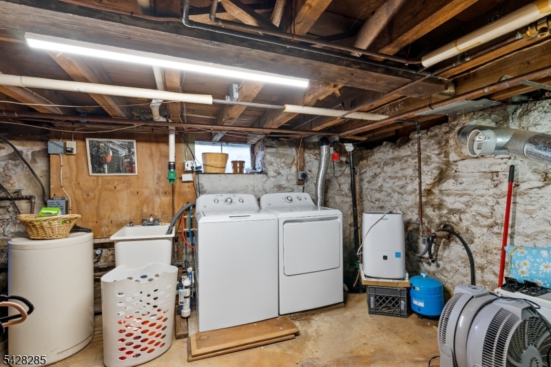 269 Quakertown Road Pittstown, NJ 08867 - Photo 25 of 25 a utility room with dryer and washer