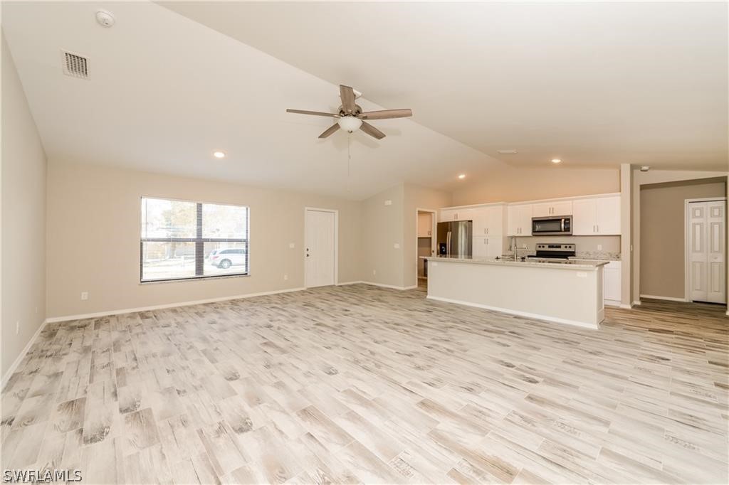 8422 Cardinal Road Fort Myers, FL 33967 - Photo 4 of 15 a view of kitchen with sink and refrigerator