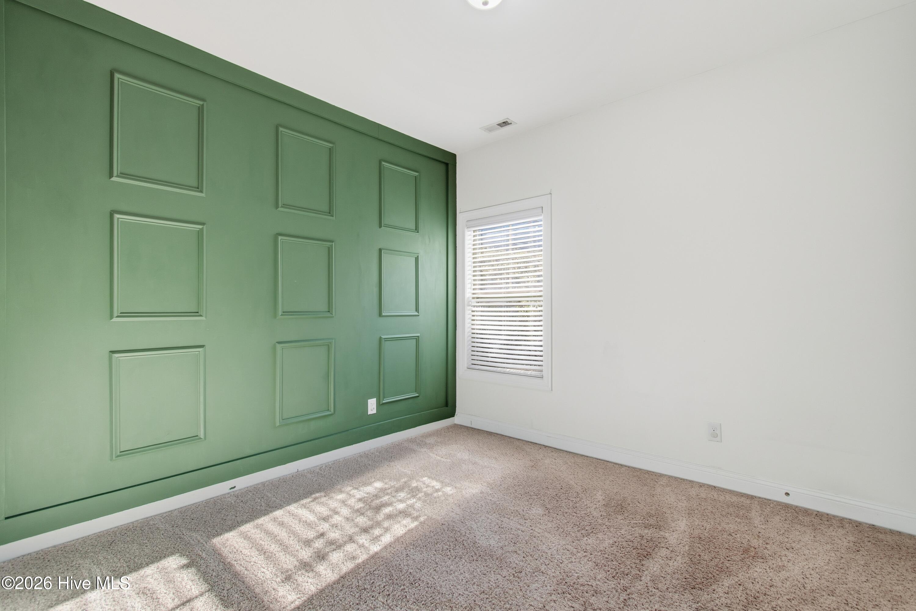 1678 Old Salt Run Southwest Shallotte, NC 28470 - Photo 31 of 73 Bedroom with accent wall.
