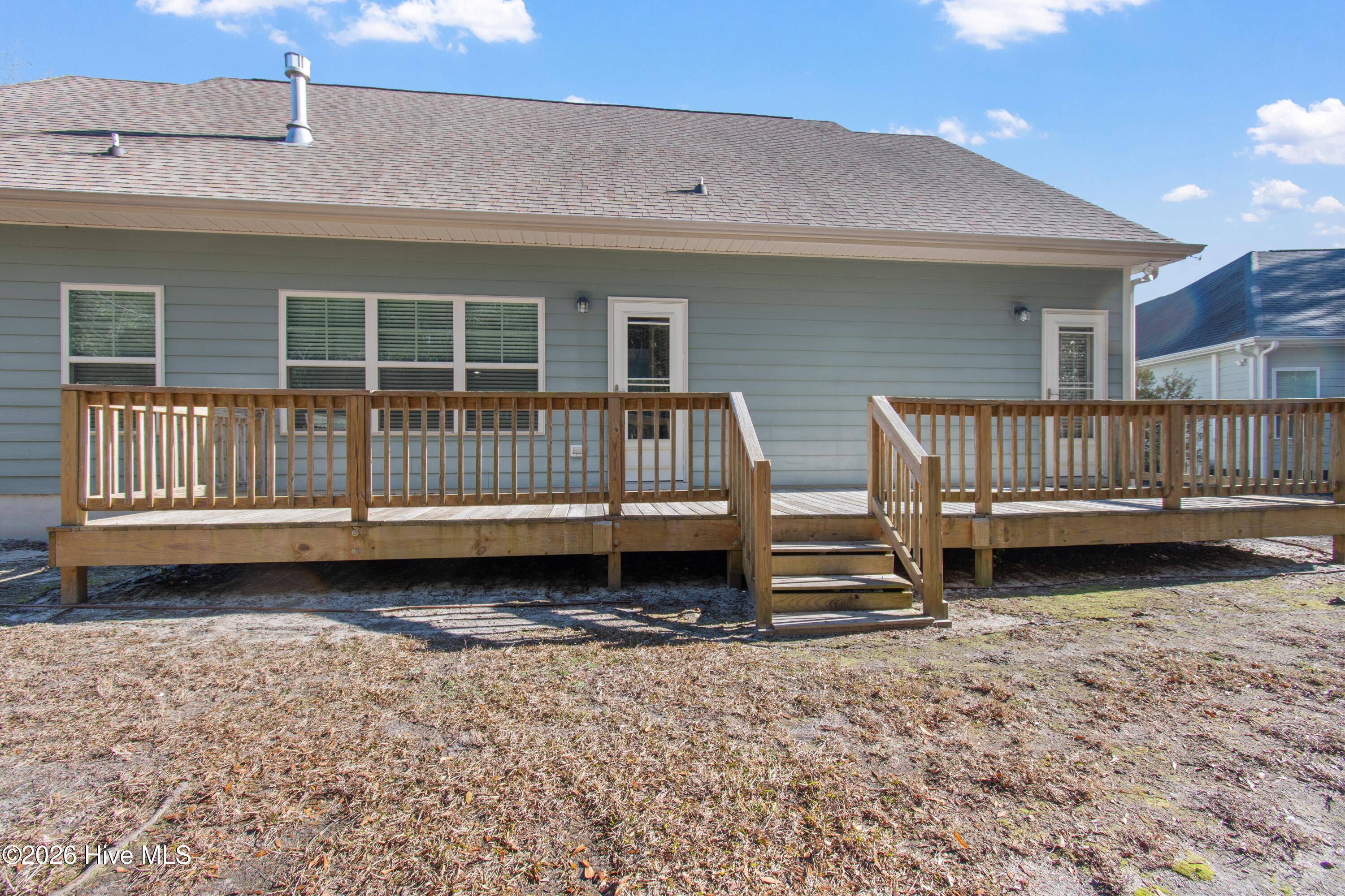1678 Old Salt Run Southwest Shallotte, NC 28470 - Photo 41 of 73 Back deck- access it from the living room or kitchen.