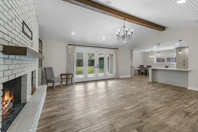 a view of kitchen with furniture and fireplace