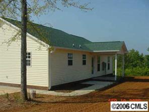 349 Sutton Spring Road, Unit 1 York, SC 29745 - Photo 4 of 8 a view of a house with backyard