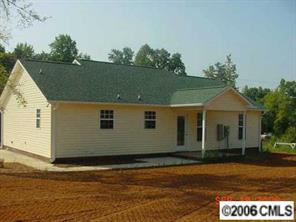 349 Sutton Spring Road, Unit 1 York, SC 29745 - Photo 5 of 8 a view of a house with a yard