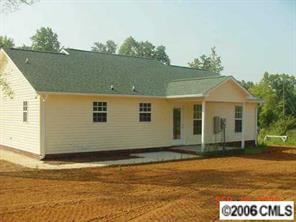 349 Sutton Spring Road, Unit 1 York, SC 29745 - Photo 6 of 8 a front view of a house with a yard