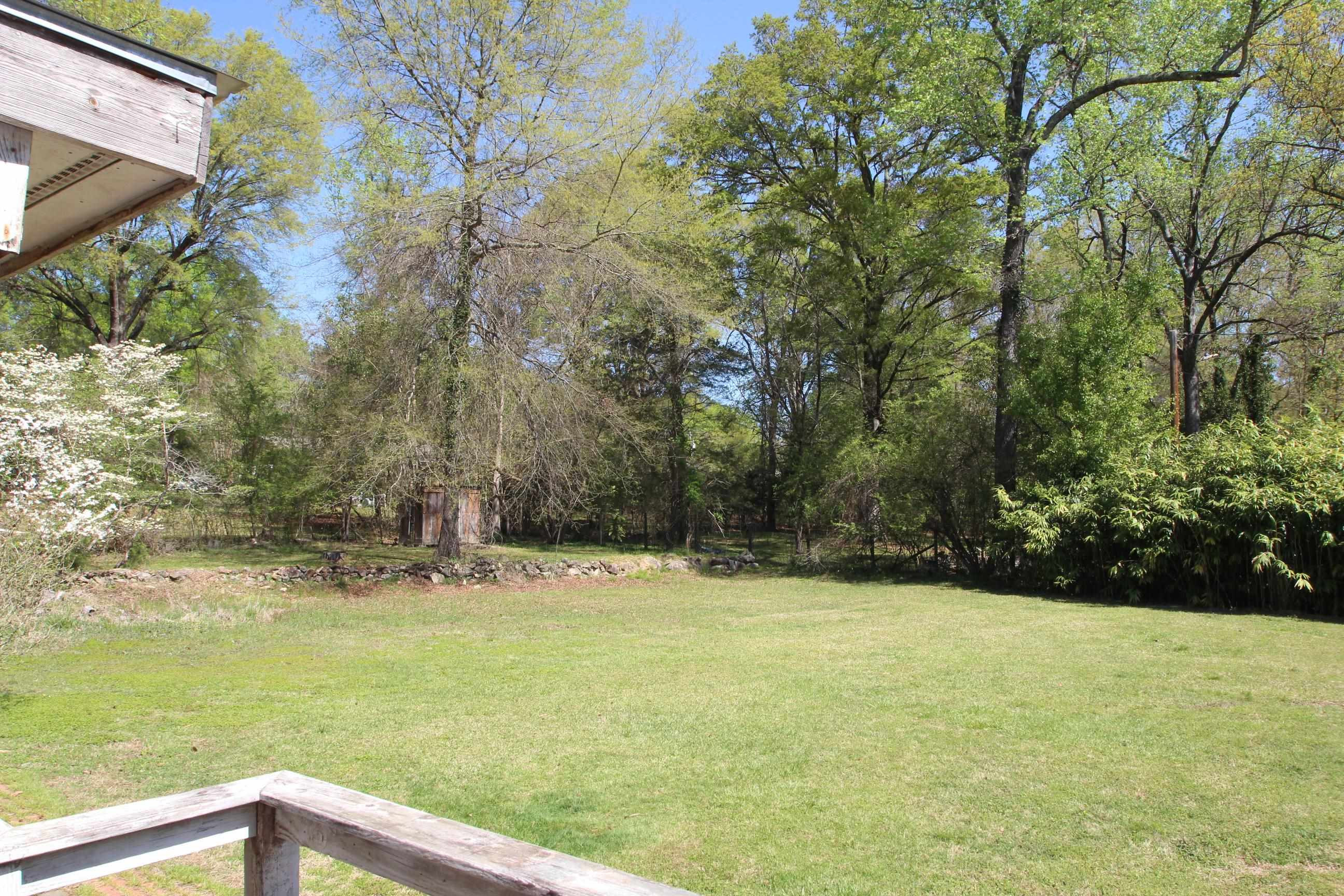 116 Pine Street Carrboro, NC 27510 - Photo 13 of 66 a view of an outdoor space and a yard