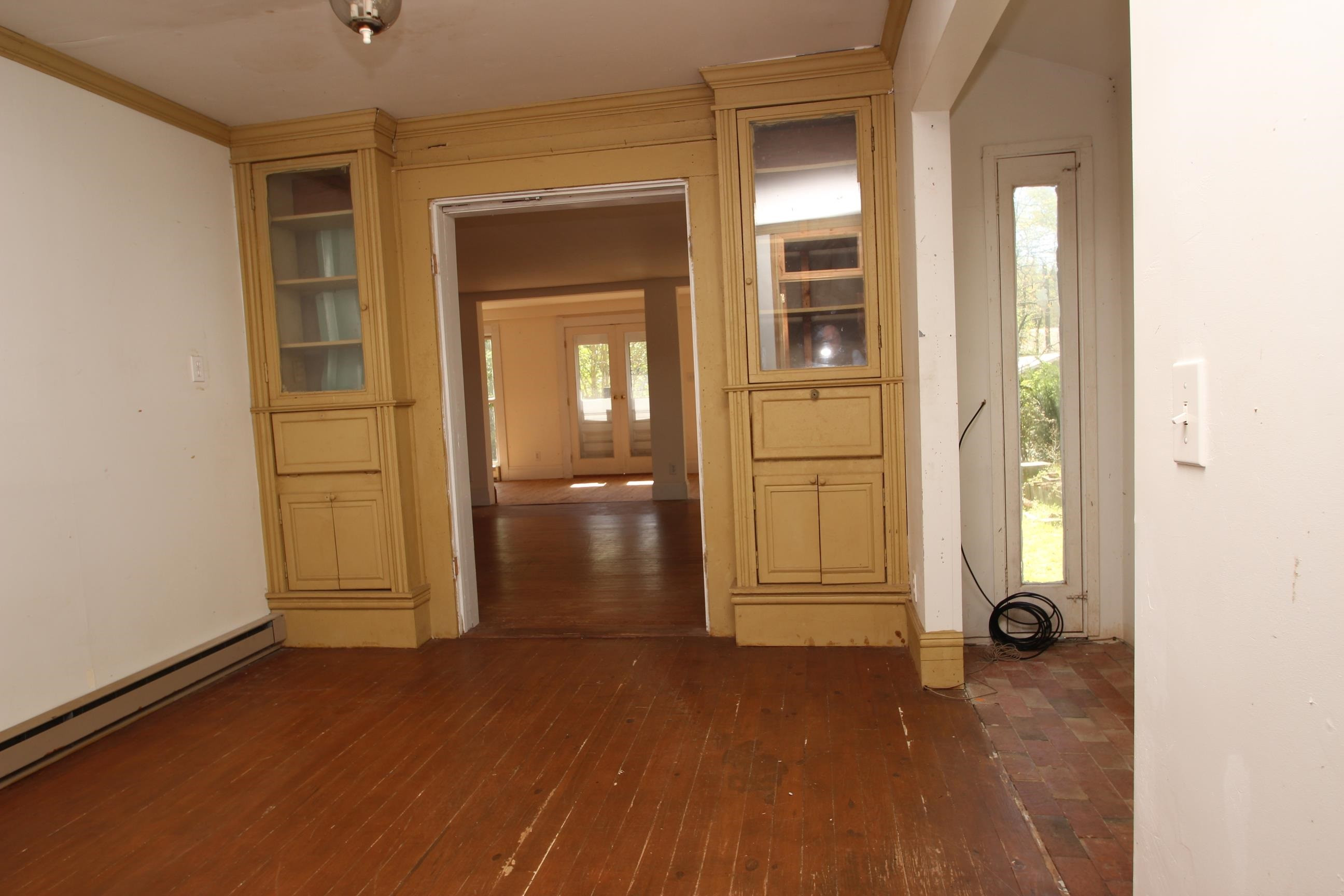 116 Pine Street Carrboro, NC 27510 - Photo 26 of 66 a view of empty room with wooden floor