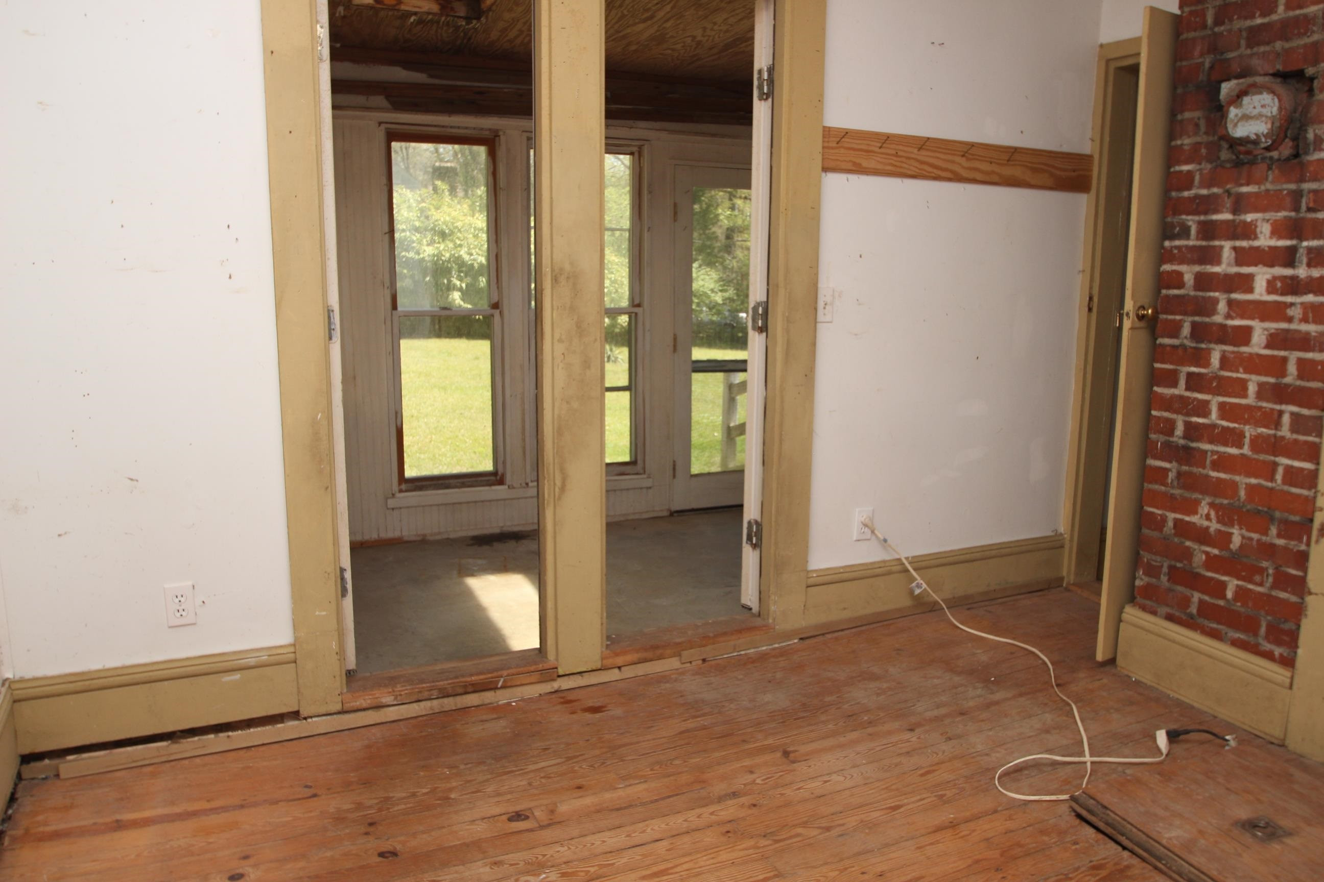 116 Pine Street Carrboro, NC 27510 - Photo 32 of 66 a view of an empty room with a mirror
