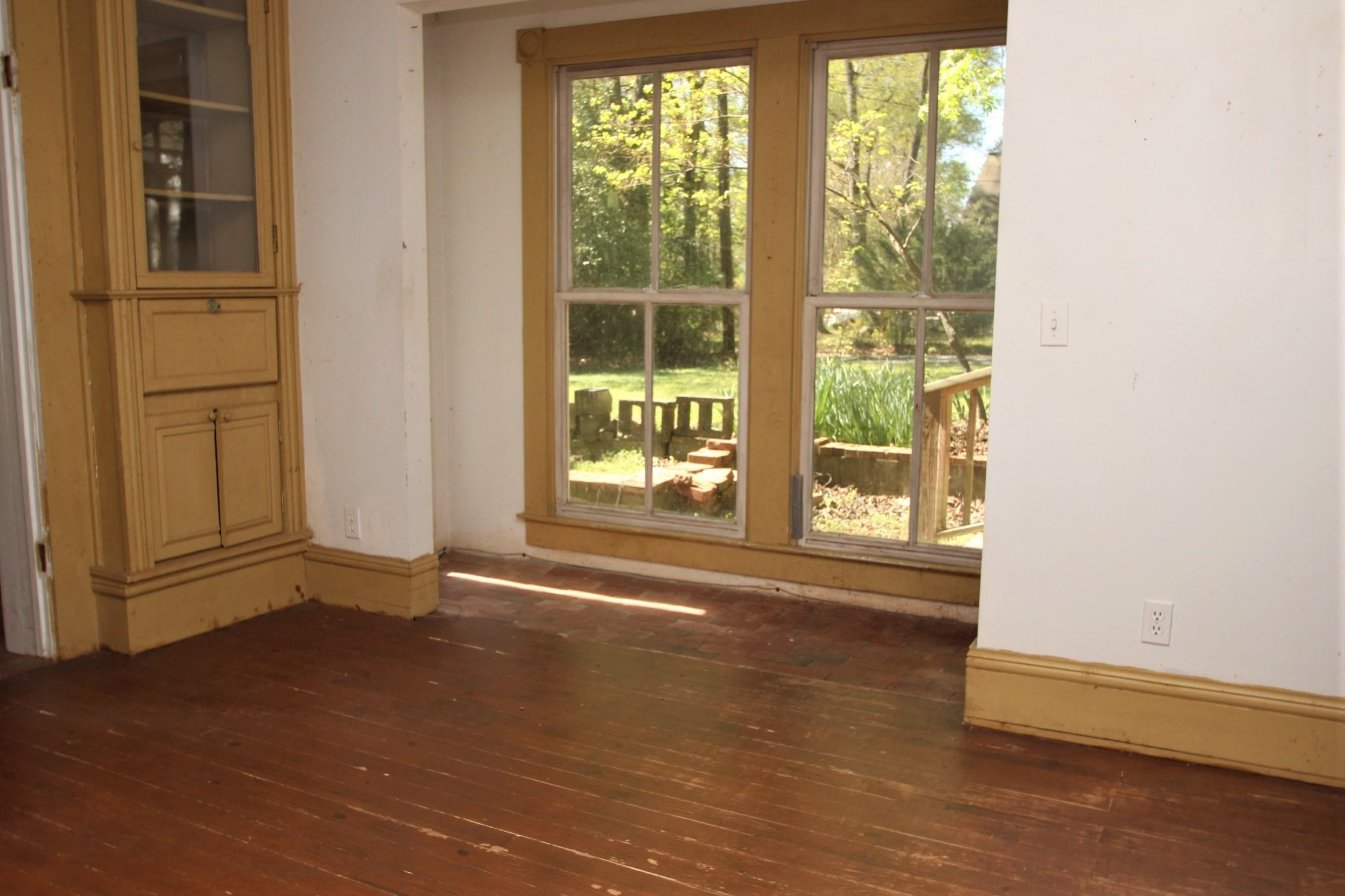 116 Pine Street Carrboro, NC 27510 - Photo 34 of 66 a view of an empty room with a window