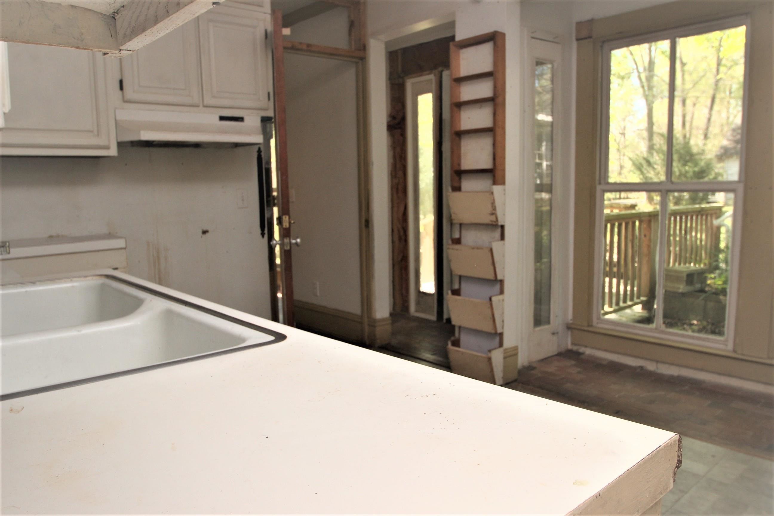 116 Pine Street Carrboro, NC 27510 - Photo 40 of 66 a room with a bed and large window with outer view