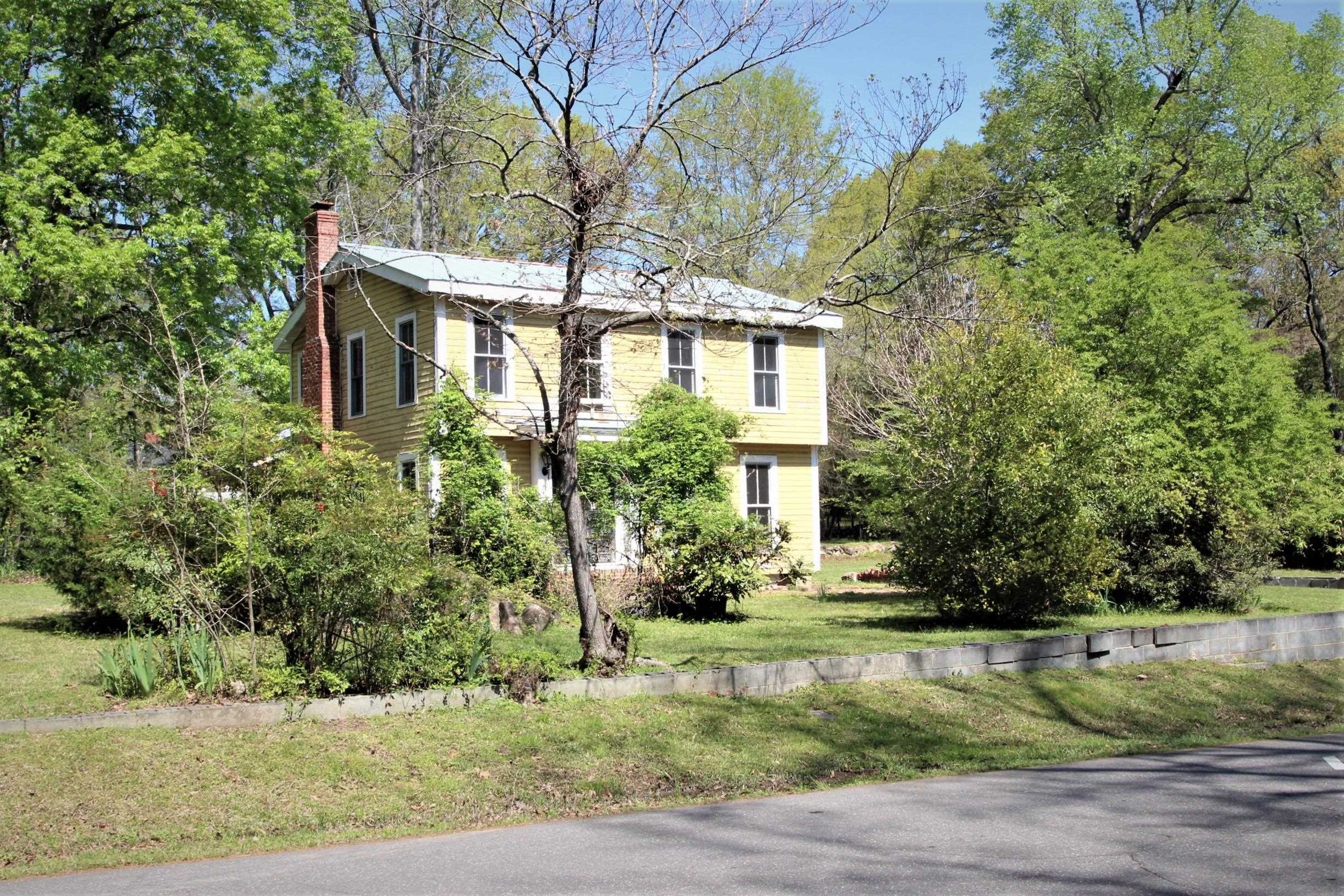 116 Pine Street Carrboro, NC 27510 - Photo 4 of 66 a front view of a house with a yard
