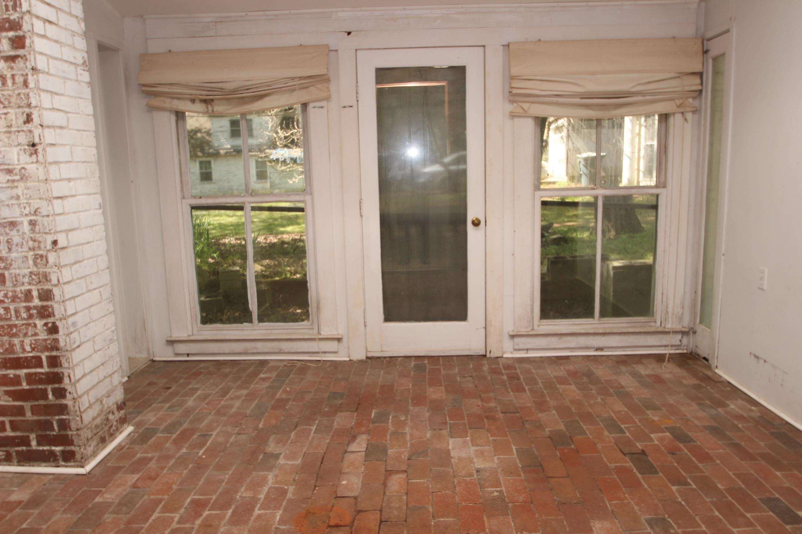 116 Pine Street Carrboro, NC 27510 - Photo 41 of 66 a view of an empty room with a window