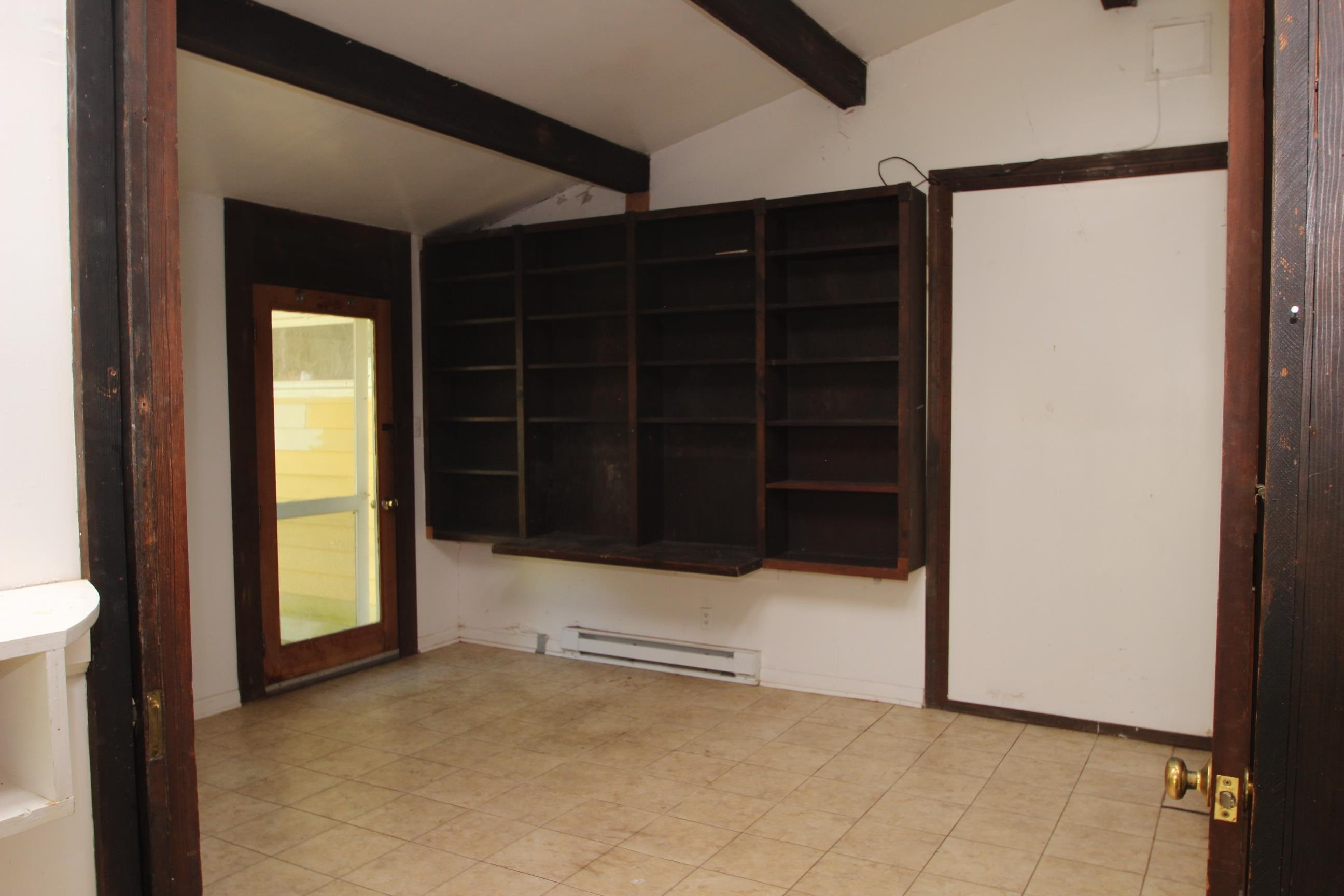 116 Pine Street Carrboro, NC 27510 - Photo 43 of 66 a view of an empty room with a gate