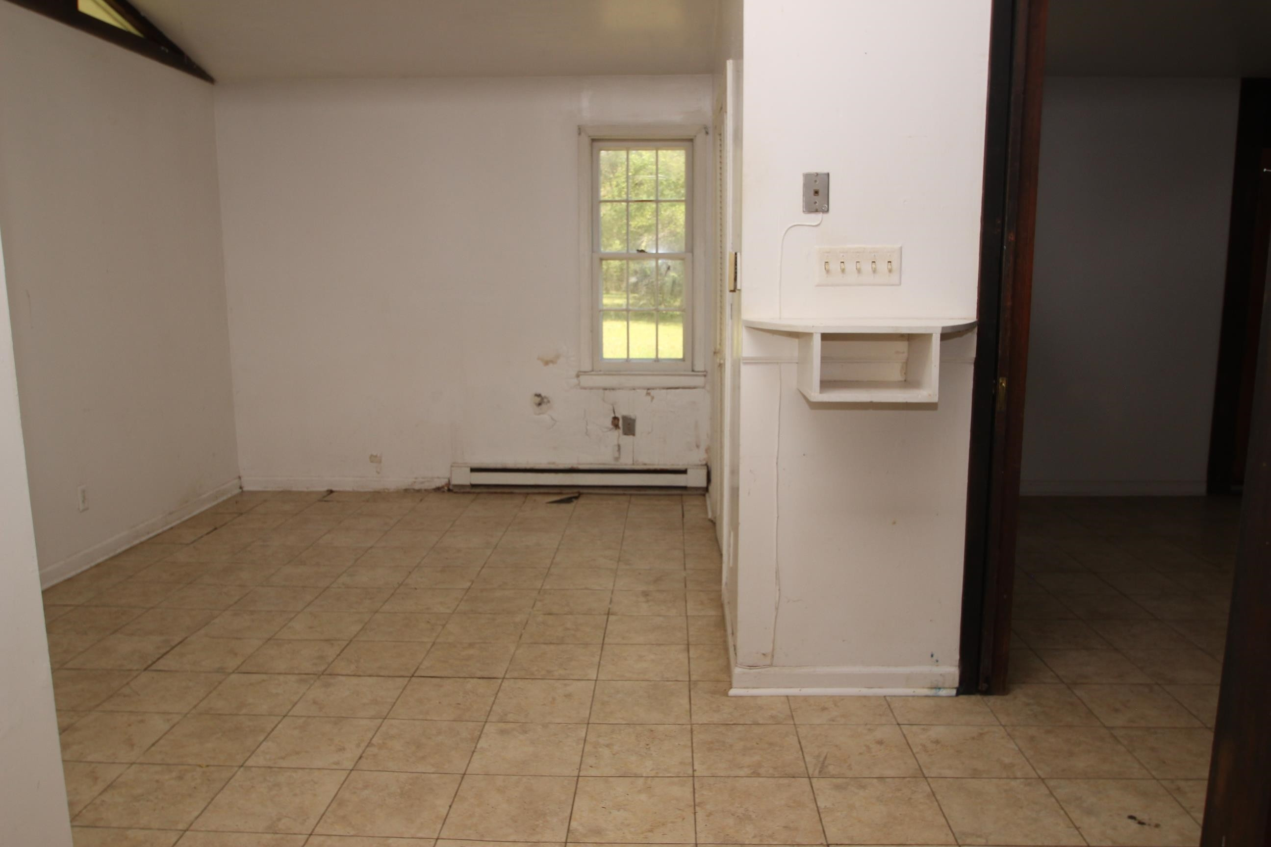 116 Pine Street Carrboro, NC 27510 - Photo 47 of 66 a view of an empty room and window
