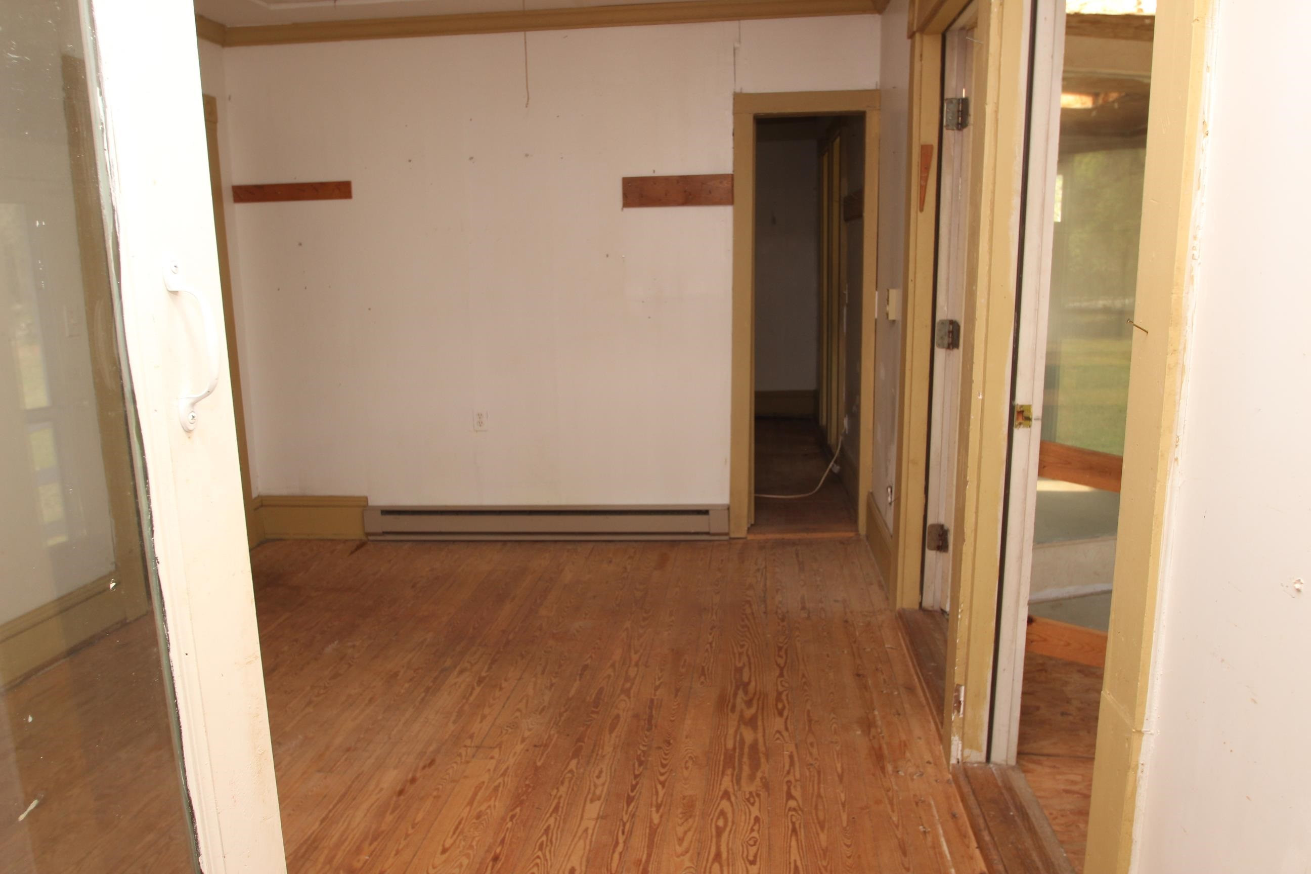 116 Pine Street Carrboro, NC 27510 - Photo 48 of 66 a view of a room with wooden floor