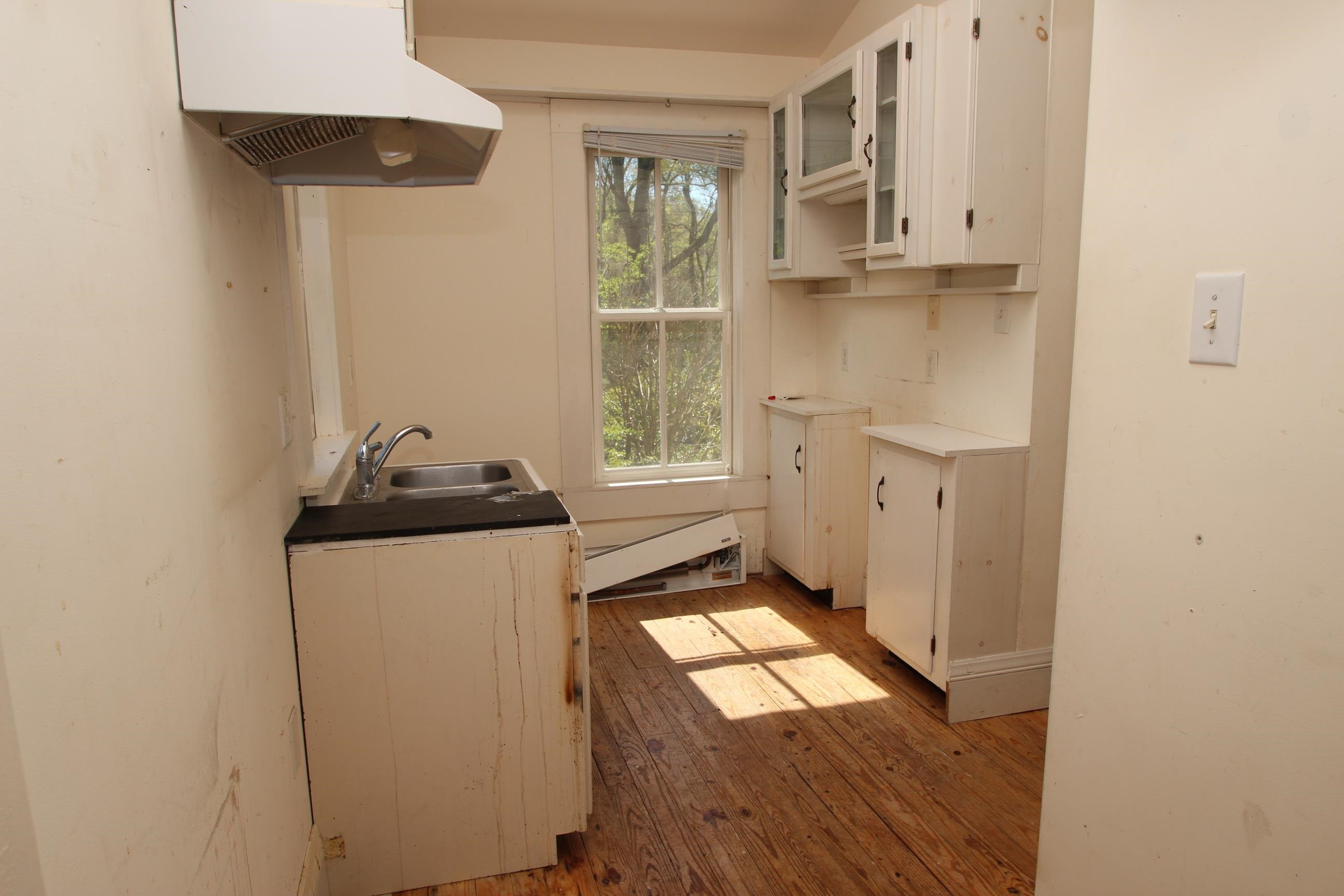 116 Pine Street Carrboro, NC 27510 - Photo 49 of 66 a utility room with wooden floor washer and dryer
