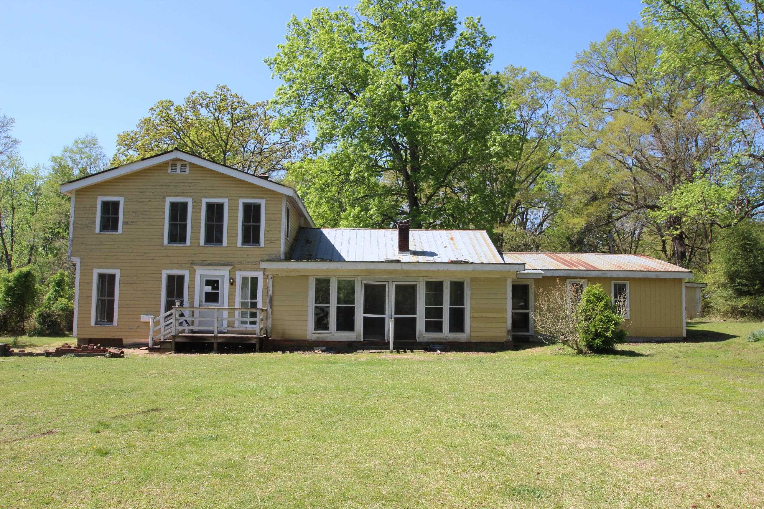 116 Pine Street Carrboro, NC 27510 - Photo 5 of 66 a front view of a house with a yard