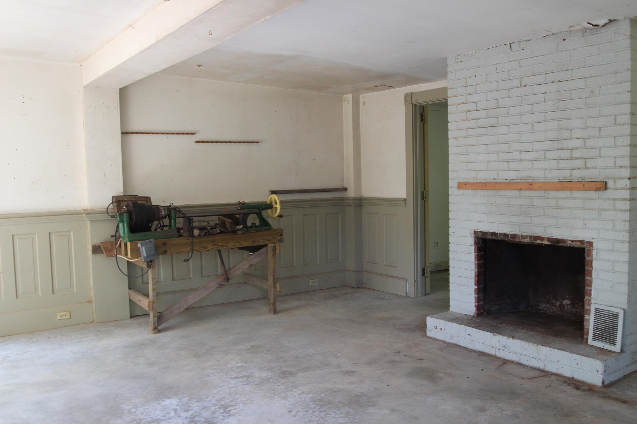 116 Pine Street Carrboro, NC 27510 - Photo 64 of 66 a living room with furniture and a fireplace