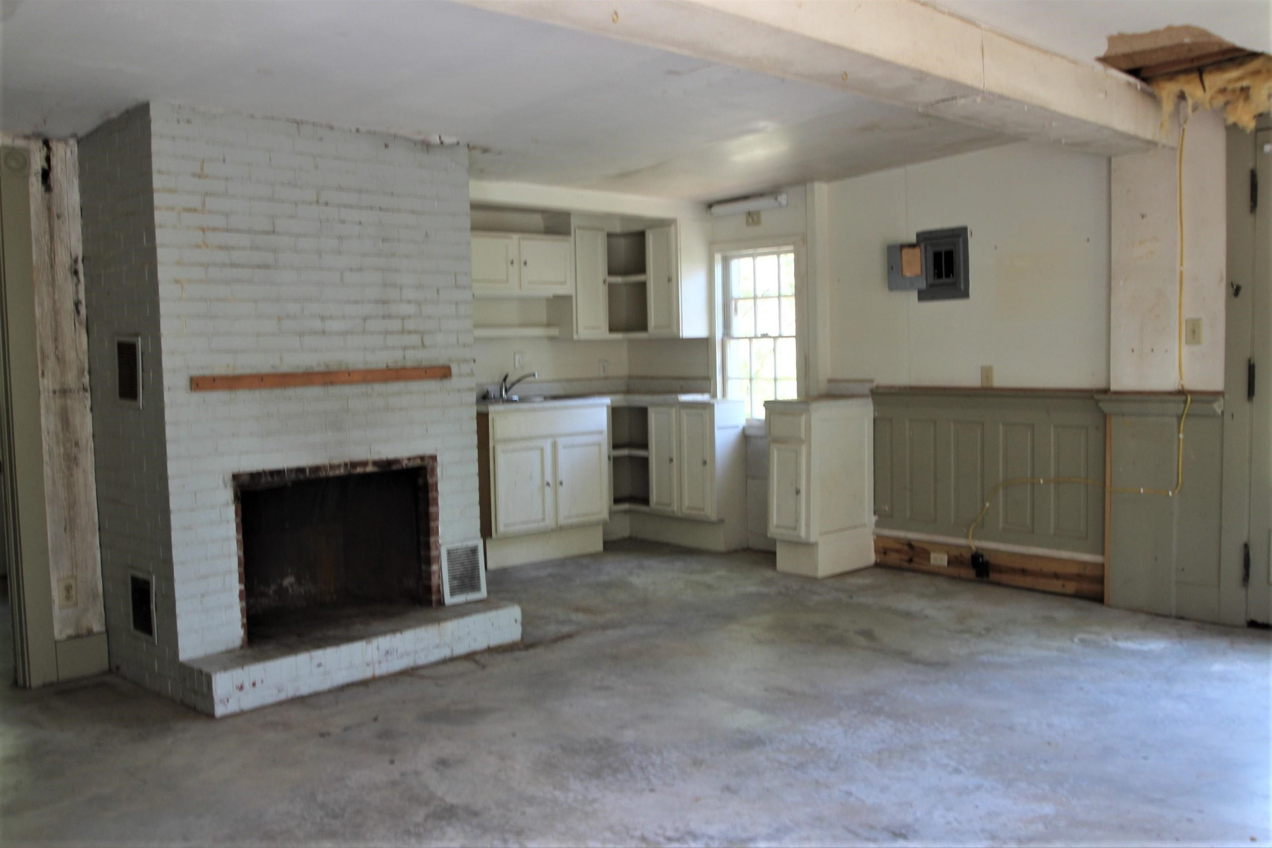 116 Pine Street Carrboro, NC 27510 - Photo 65 of 66 a view of a livingroom with an empty space