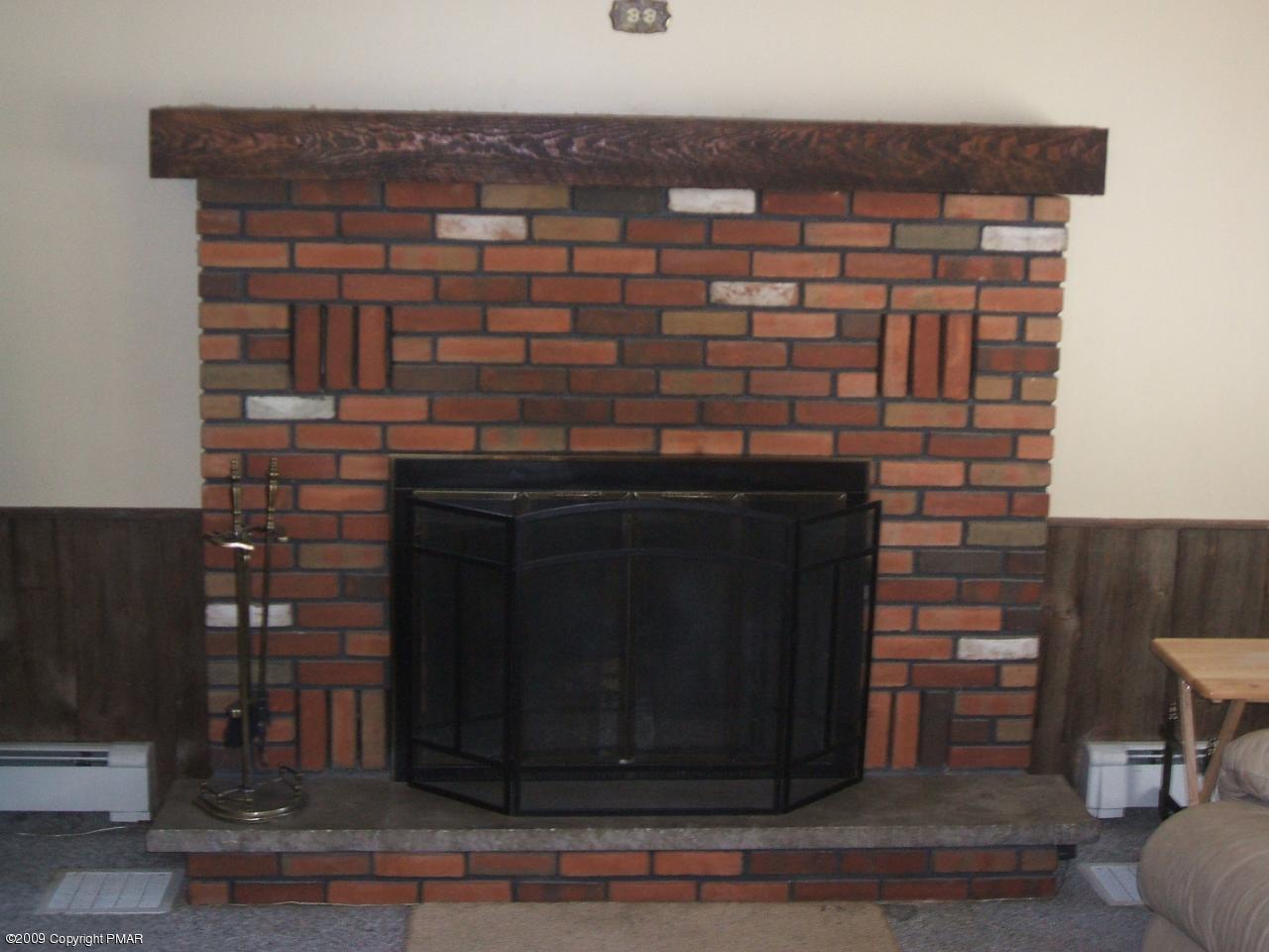 241 Edgemont Road Stroudsburg, PA 18360 - Photo 7 of 17 Brick Fireplace in Family Room
