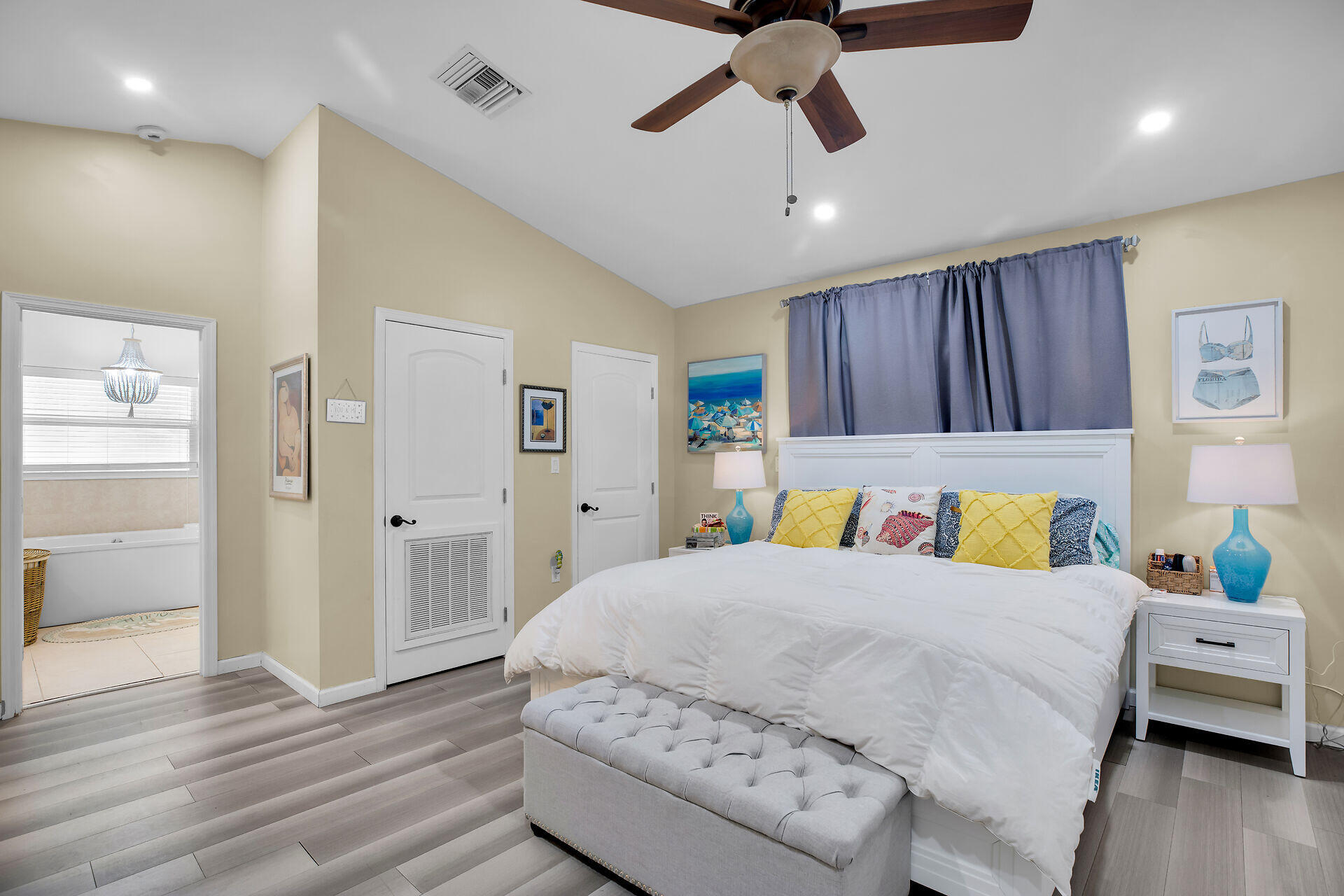 1041 Gibraltar Road Key Largo, FL 33037 - Photo 24 of 36 a bedroom with a bed and wooden floor