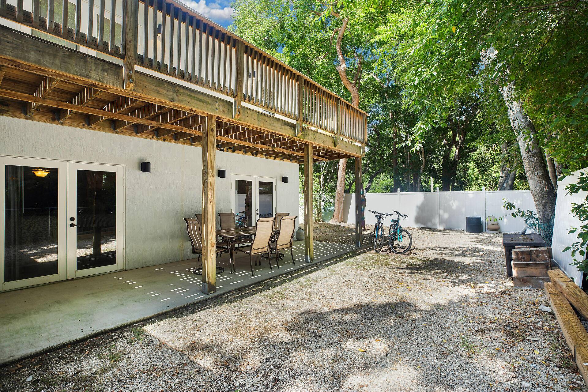 1041 Gibraltar Road Key Largo, FL 33037 - Photo 31 of 36 a view of a house with backyard and sitting area