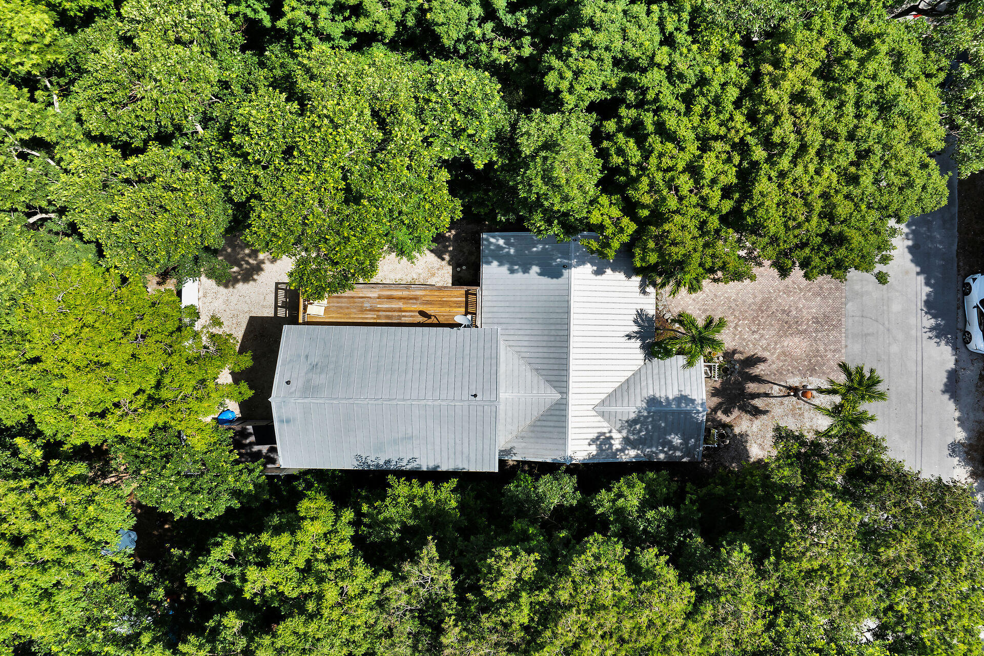 1041 Gibraltar Road Key Largo, FL 33037 - Photo 33 of 36 an aerial view of a house with a yard
