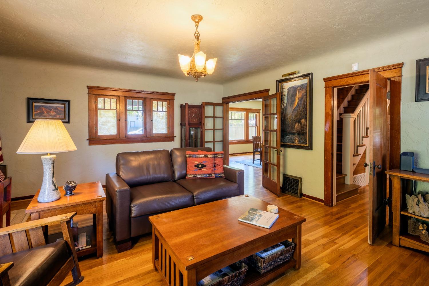 46 Pollasky Avenue Clovis, CA 93612 - Photo 14 of 69 a living room with furniture and wooden floor