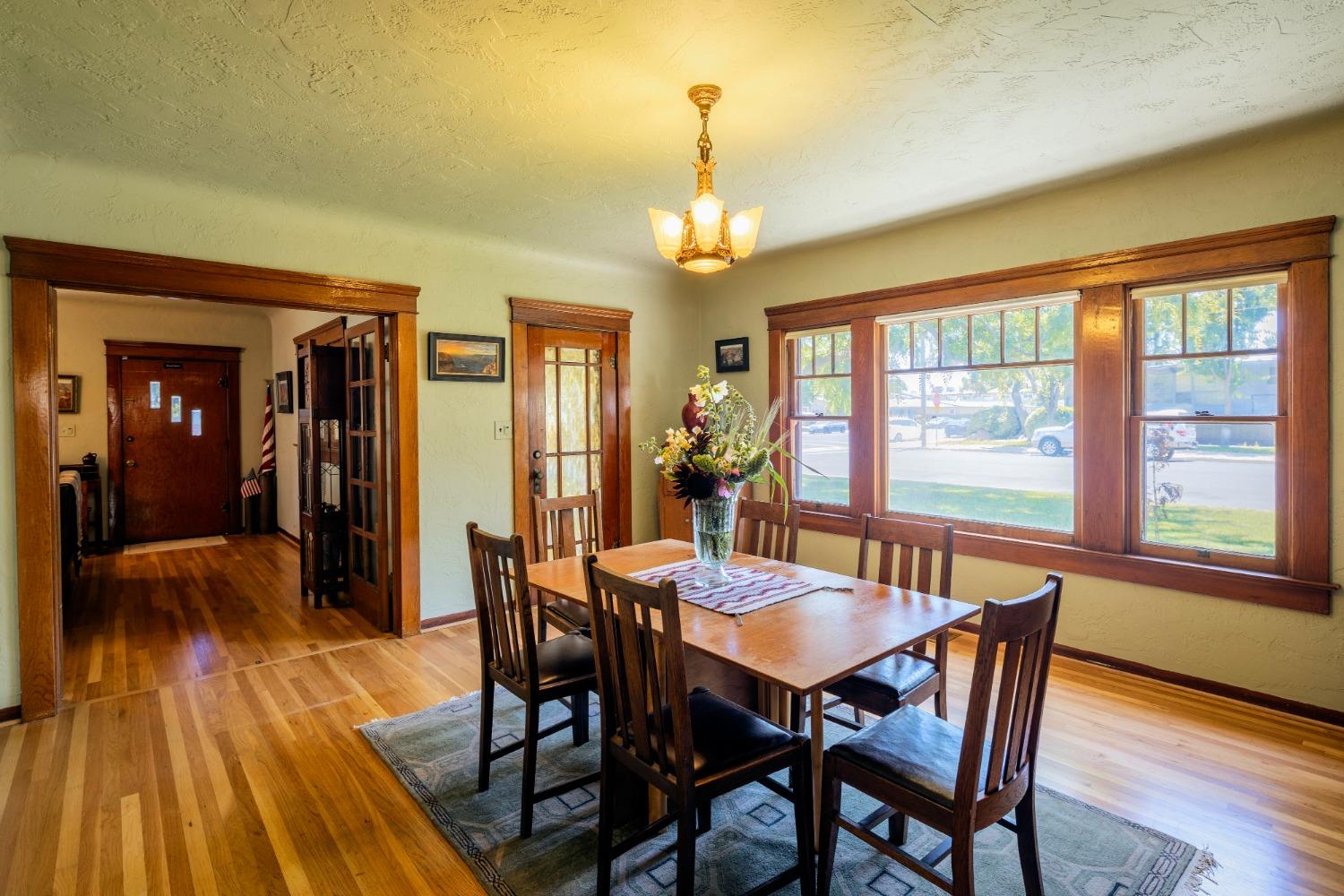 46 Pollasky Avenue Clovis, CA 93612 - Photo 15 of 69 a view of a dining room with furniture window and wooden floor