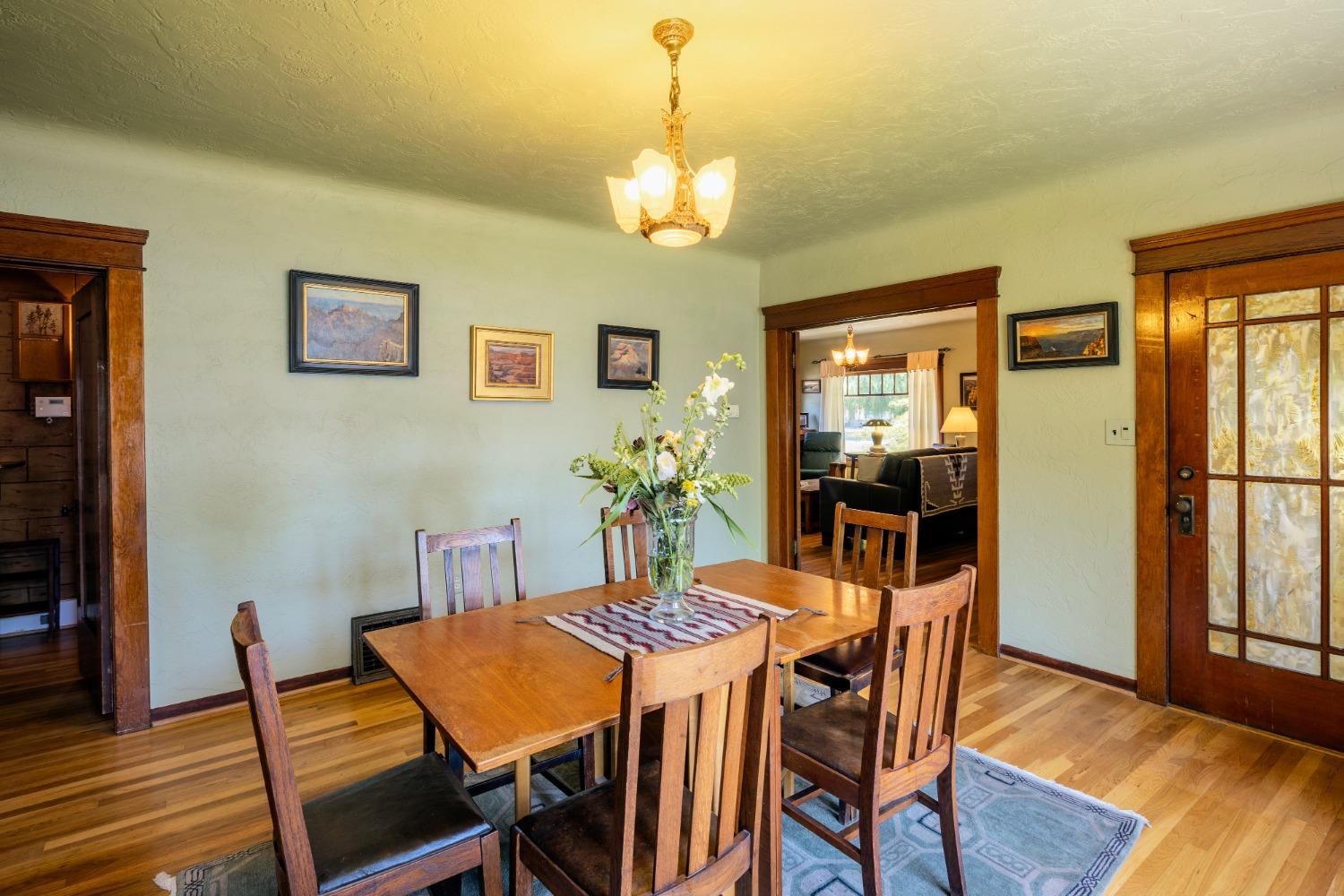 46 Pollasky Avenue Clovis, CA 93612 - Photo 16 of 69 a view of a dining room with furniture and wooden floor
